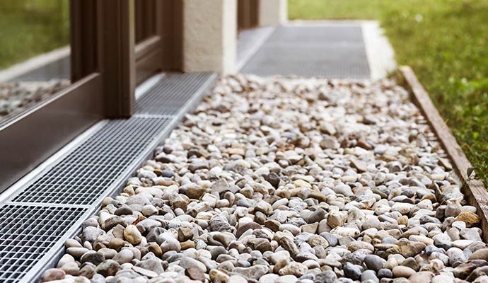 A backyard trench drainage system