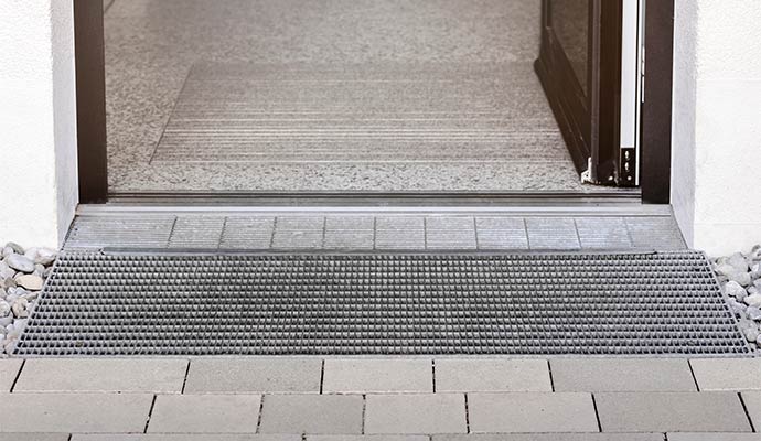 Newly installed entryway drainage system