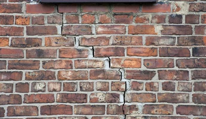 Cracked foundation brick wall Cracked foundation brick wall