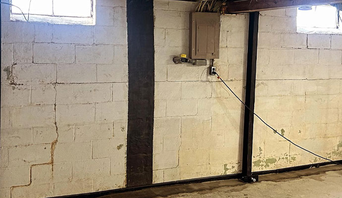 Common signs of foundation damage in a home, including cracks, bowing walls, and uneven floors.